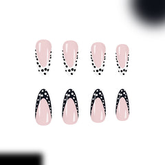 Midnight Muse press-on nails applied