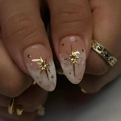 Golden Halo Celestial Almond Press-On Nails on hand