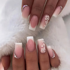 Rosé Spark press-on nails applied
