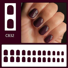 Plum Noir Glossy Deep Plum Short Square Press-On Nails on hand