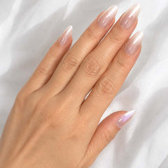 Hand with long, manicured nails on a white background