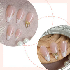 Golden Kiss press-on nails close-up