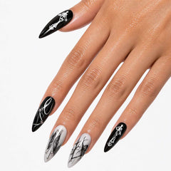 Reusable press-on nails with dark gothic art pattern in long stiletto shape