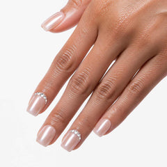 Bare Luxe pearl pink crystal square and oval press-on nails styled for bridal looks with delicate sparkle and glossy shine