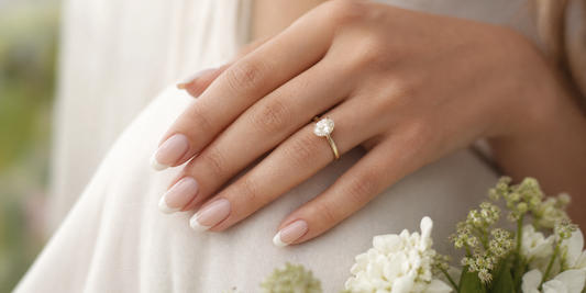 Soft French press-on nails with an engagement ring for photo-ready close-ups