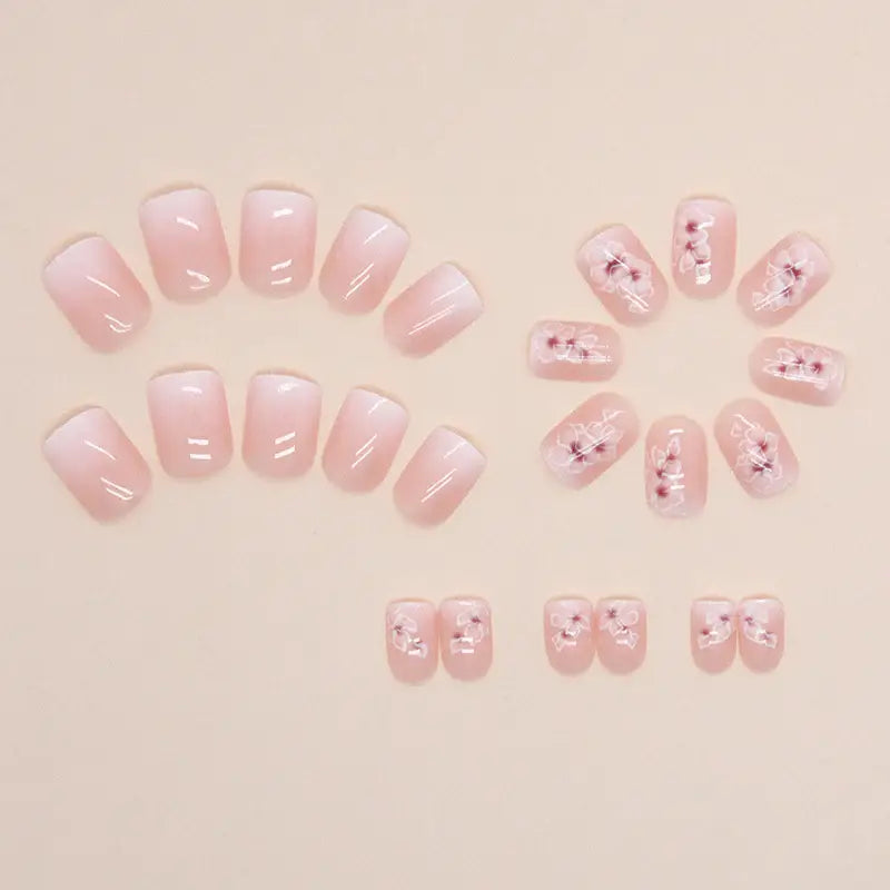 Ivory Bloom press-on nails applied