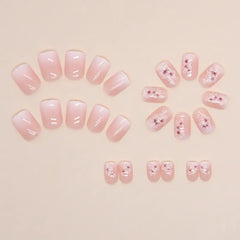 Ivory Bloom press-on nails applied