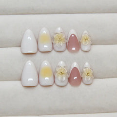Peach Bloom press-on nails applied