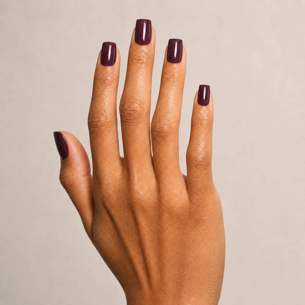 Cherry Noir Square press-on nails on hand