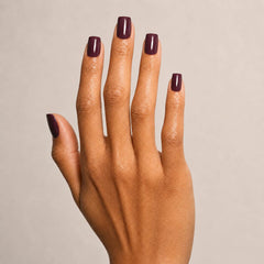 Cherry Noir Square press-on nails on hand