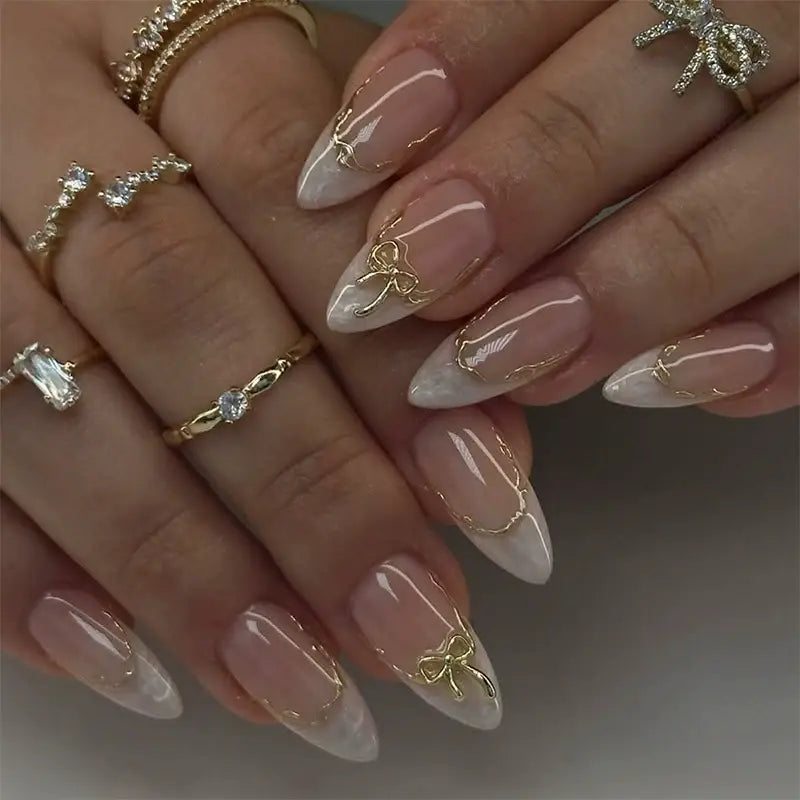 Golden Kiss press-on nails close-up