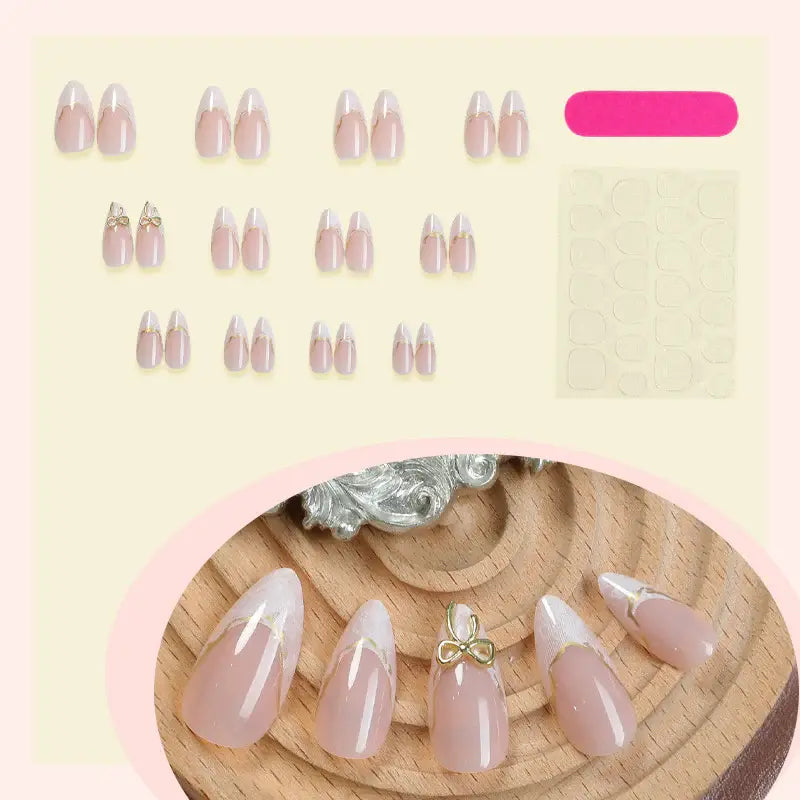 Golden Kiss press-on nails on hand