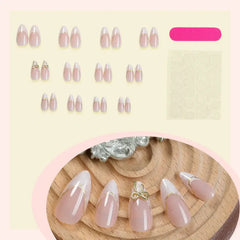 Golden Kiss press-on nails on hand