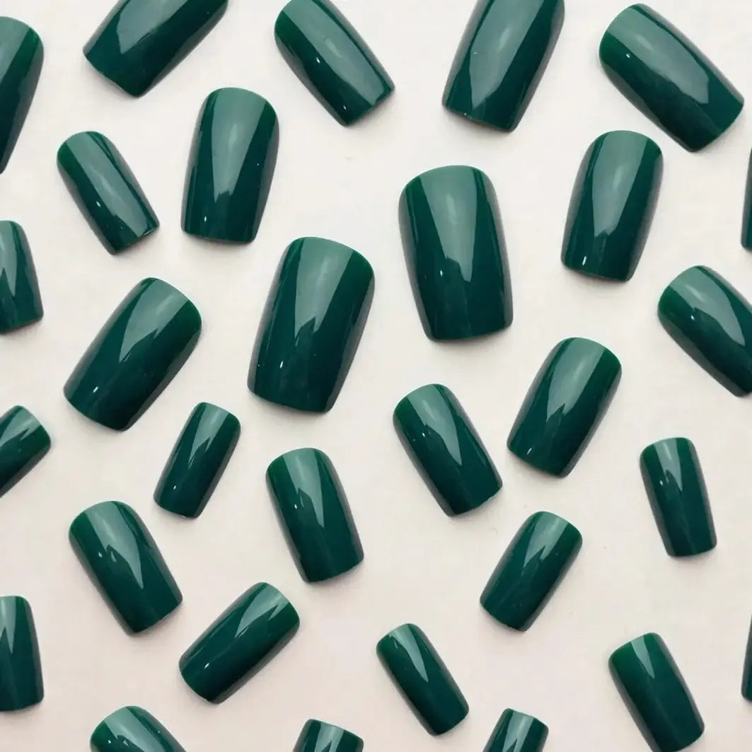 Emerald Veil press-on nails on hand