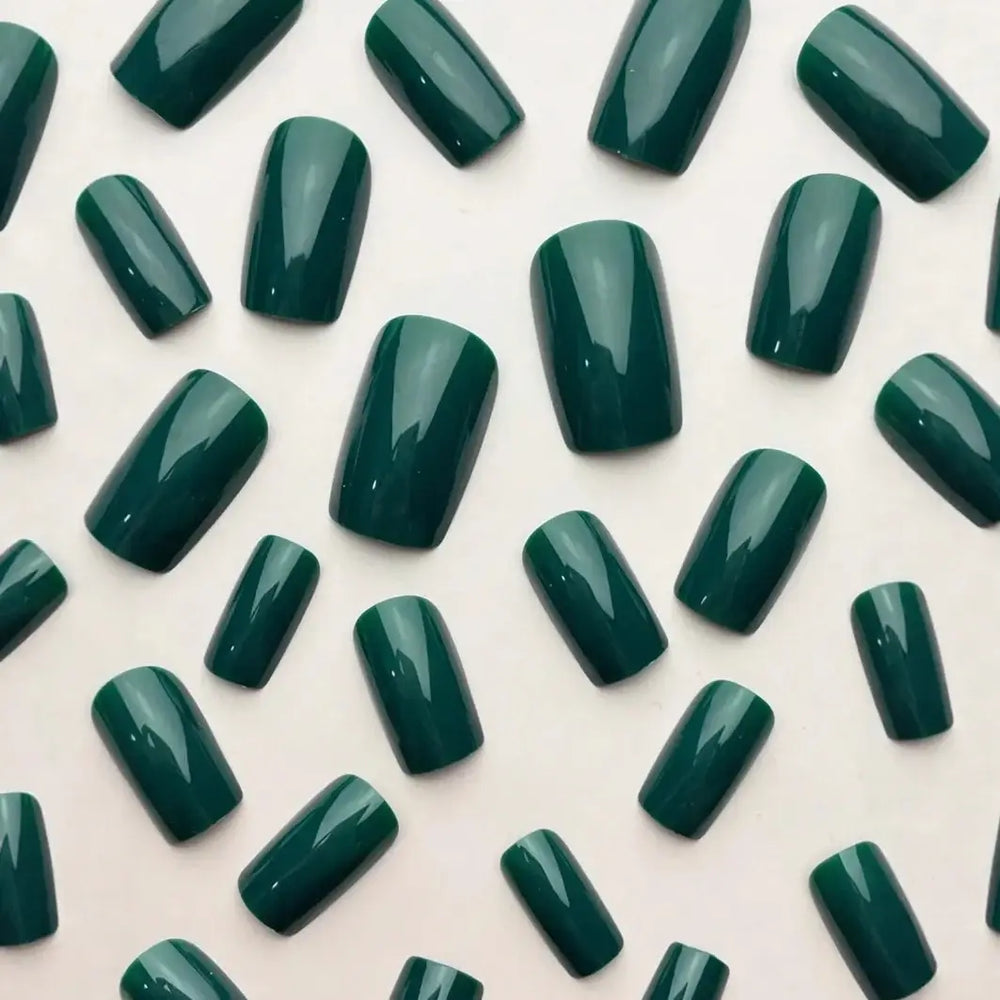 Emerald Veil press-on nails on hand
