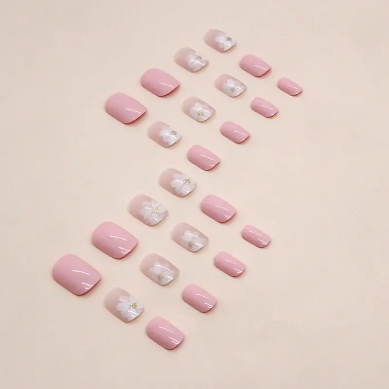 Blush Blossom press-on nails close-up