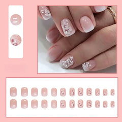 Ivory Bloom press-on nails on hand
