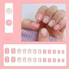 Blush Blossom press-on nails on hand