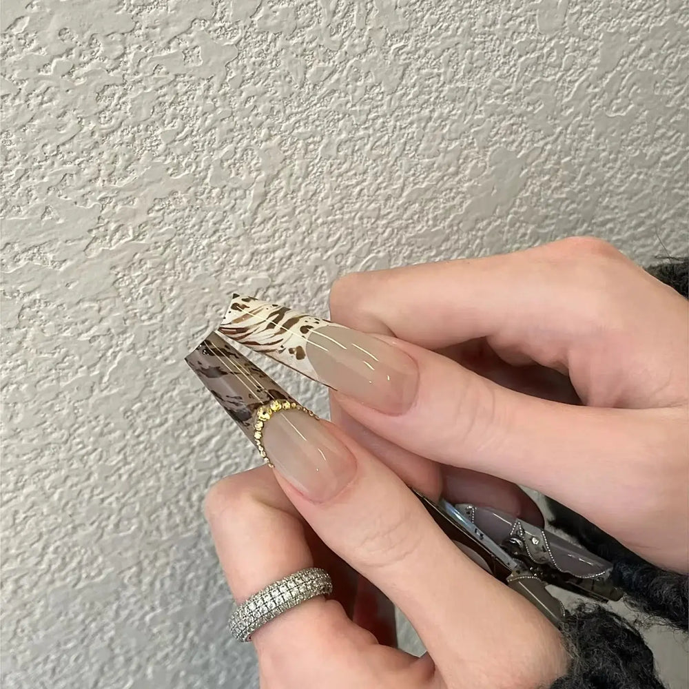 Wild Muse press-on nails applied