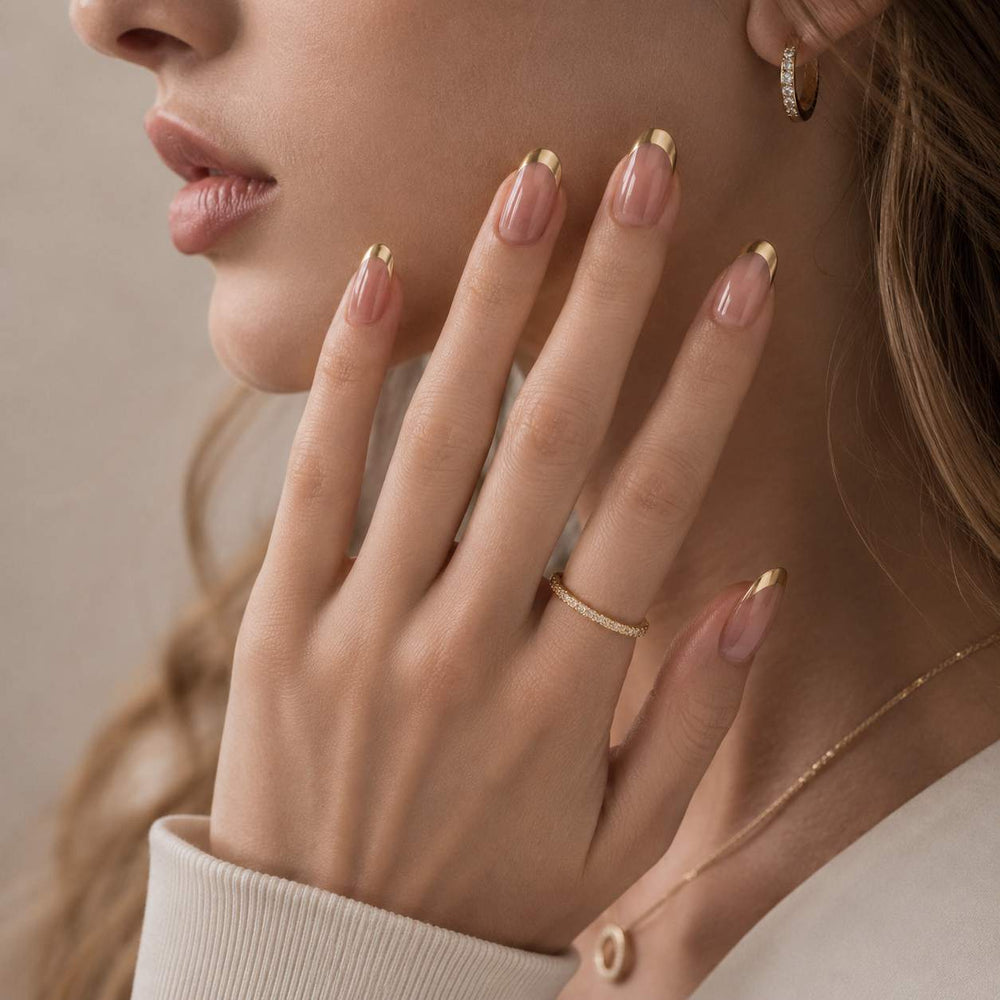 Soft Gold French press-on nails applied
