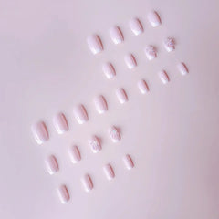 Pink Satin press-on nails on hand