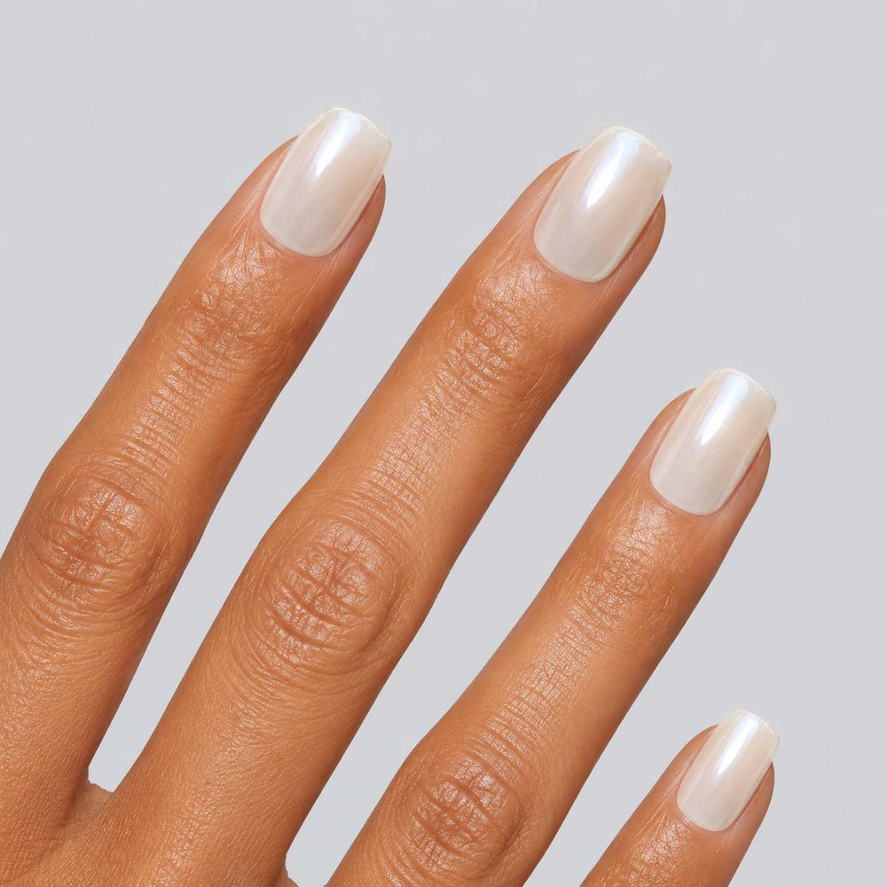 Close-up of Nailora Pearl White Short Square Press-On Nails highlighting smooth pearl finish, glossy shine, and premium salon-quality craftsmanship