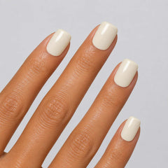 Nailora Vanilla Cloud Glossy Square Press-On Nails in creamy vanilla white, featuring a short square shape, glossy finish, reusable salon-quality design, and minimalist everyday manicure style.