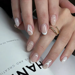 Nude Sketch short almond French press-on nails with white abstract line art