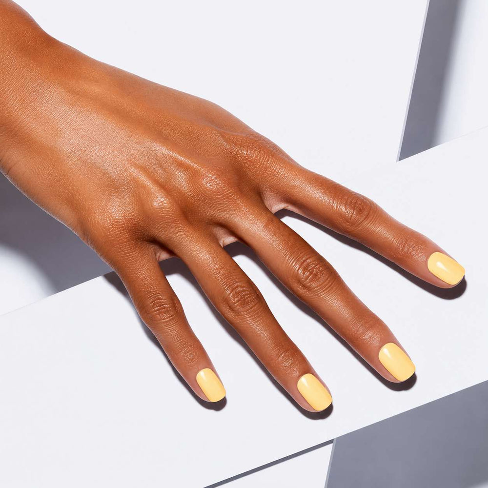 Nailora Lemon Sorbet Glossy Square Press-On Nails styled for summer elegance with fresh lemon yellow color and modern minimalist aesthetic