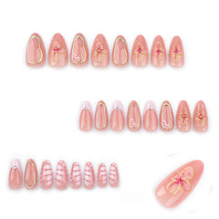 Golden Blush press-on nails on hand