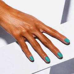 Nailora Turquoise Lagoon Glossy Square Press-On Nails styled for coastal chic elegance with vibrant turquoise color and modern summer aesthetic