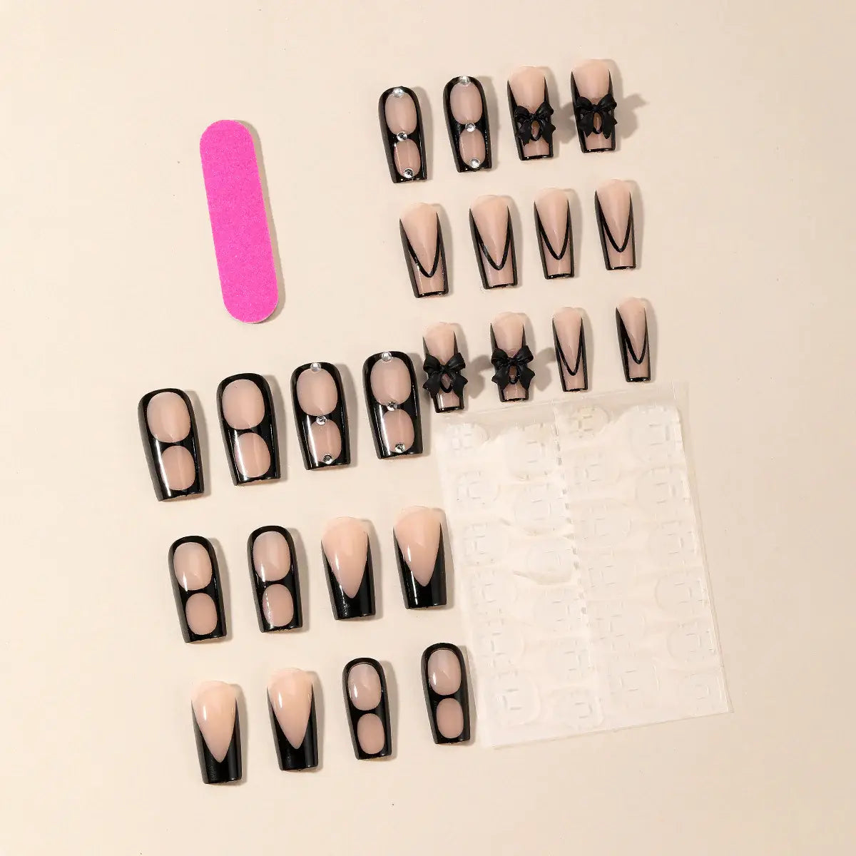 Midnight Bow press-on nails on hand