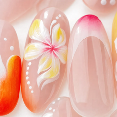 Nail art with a floral design on a light pink background