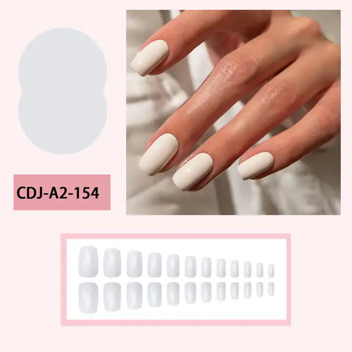 White Veil press-on nails on hand