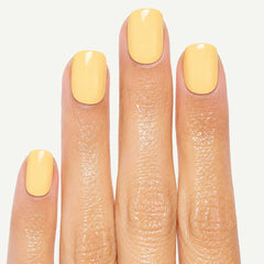 Close-up of Nailora Lemon Sorbet Glossy Square Press-On Nails highlighting soft pastel yellow color, glossy finish, and premium salon-quality craftsmanship