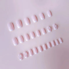 Pink Satin press-on nails close-up