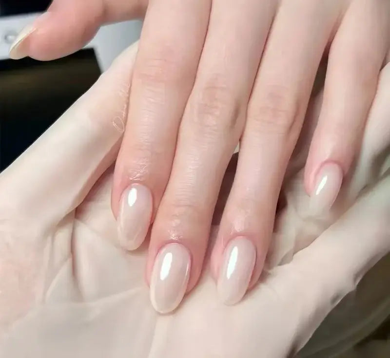 Glazed Pearl press-on nails applied