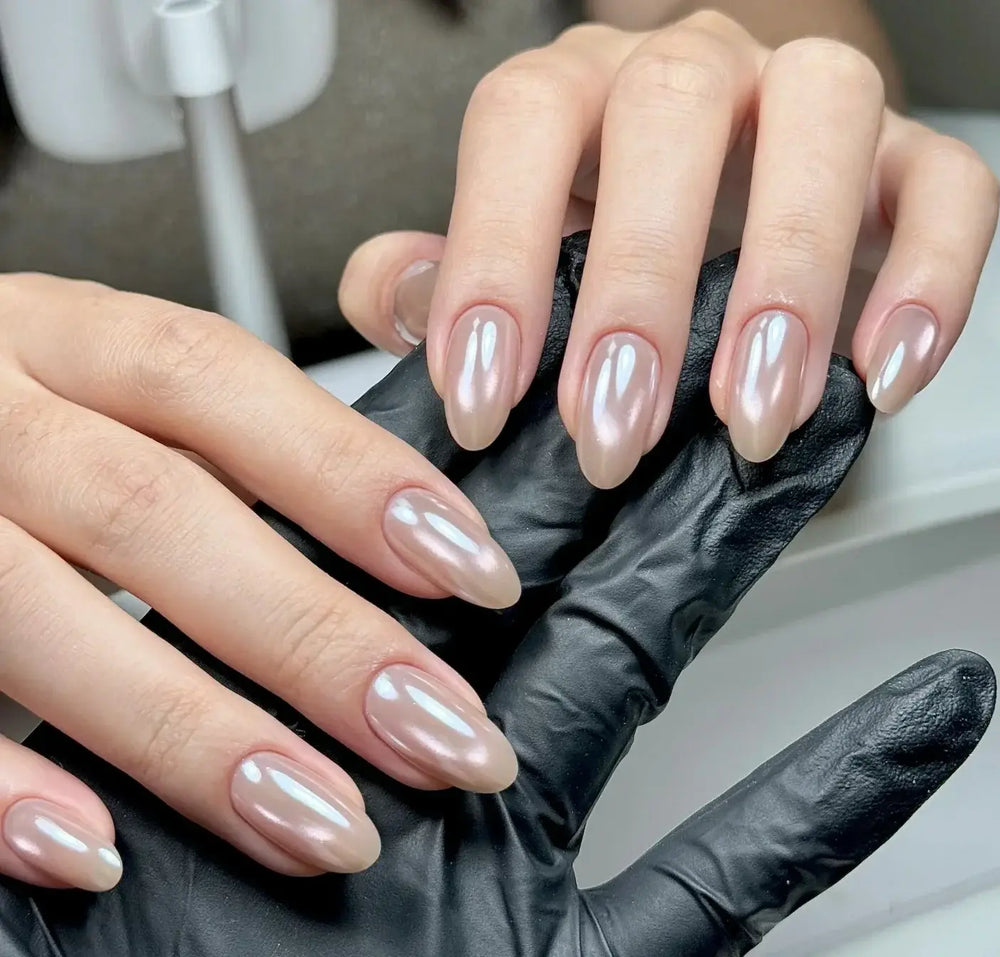 Aurora Veil nude aurora cat-eye almond press-on nails with glazed shimmer finish