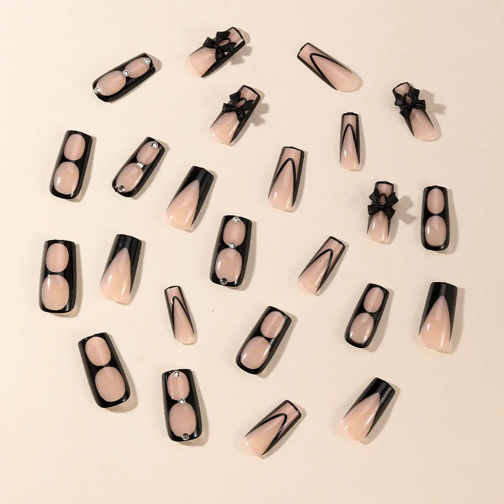 Midnight Bow press-on nails close-up