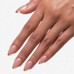 Soft Gold French press-on nails on hand