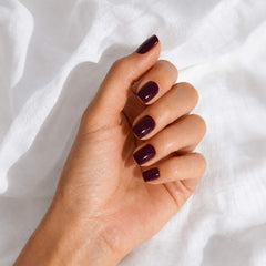 Cherry Noir Square press-on nails applied