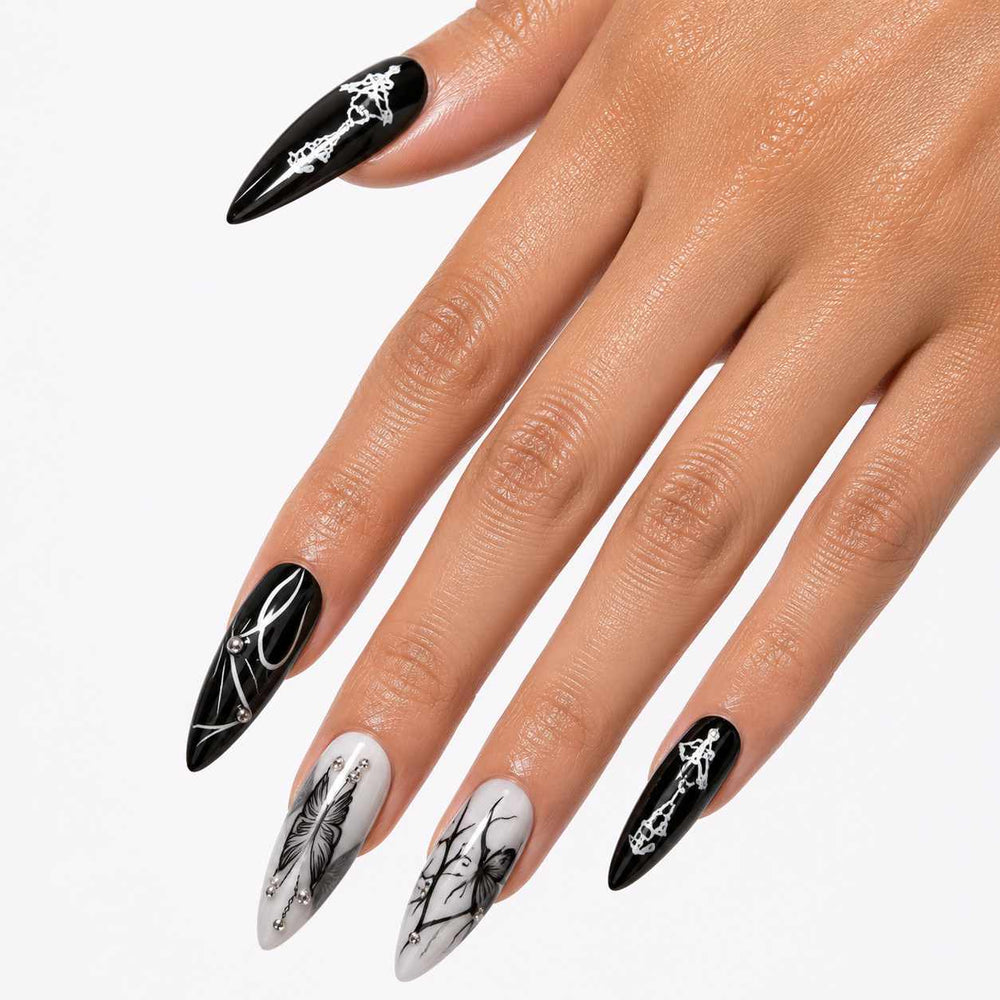 Reusable press-on nails with dark gothic art pattern in long stiletto shape