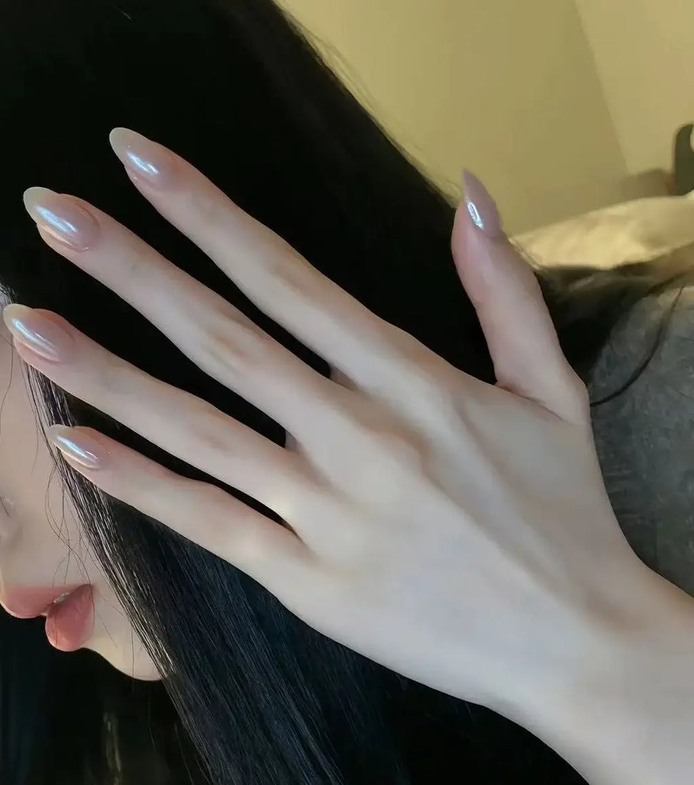Glazed Blush press-on nails applied