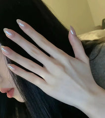 Glazed Blush press-on nails applied