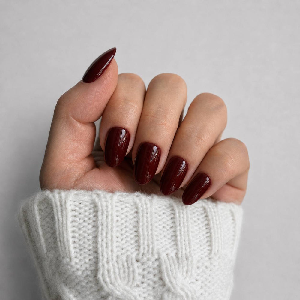 Nailora Espresso Brown Glossy Short Almond Press-On Nails featuring a rich coffee-brown shade with a reusable salon-quality finish for everyday and autumn wear.