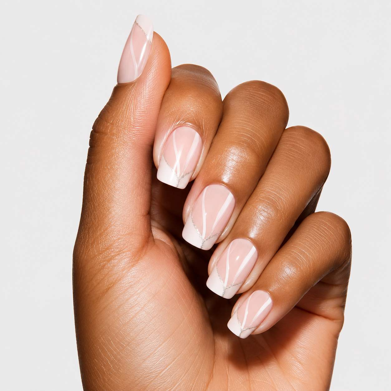Ivory Spark white glitter French short ballerina press-on nails styled for bridal looks