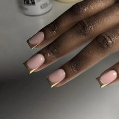 Champagne Halo press-on nails on hand